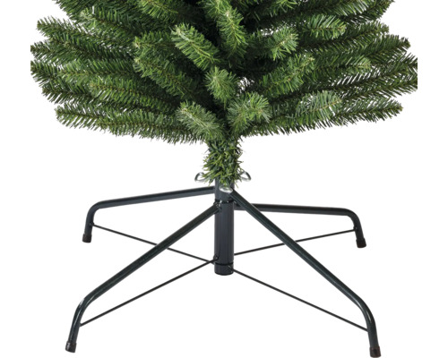 Detailopname van een kunstkerstboom met metalen standaard