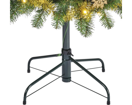 Metalen kerstboomstandaard met boom en decoratie
