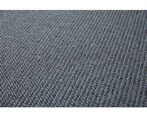 Close-up van een grijs tapijt met textielstructuur
