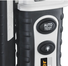 Detailopname van een spanningstester met ''Auto Test'' knop en lamp symbool