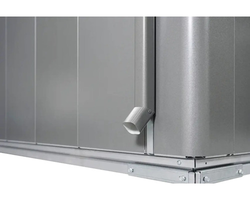 Detailopname van een tuinhuis met regenpijp