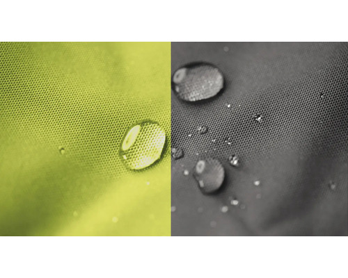 Close-up van waterafstotende stof met waterdruppels