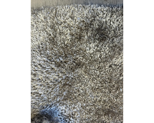 Detail van een hoogpolig vloerkleed