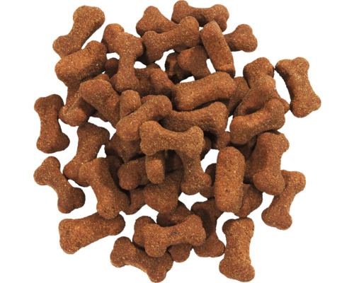Bruin hondenvoer in botvorm