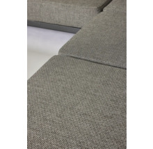 Detailopname van een grijze bank met stoffen bekleding