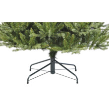 Detailopname van een kunstkerstboom met metalen voet
