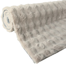 Opgerolde laagpolige vloerkleed