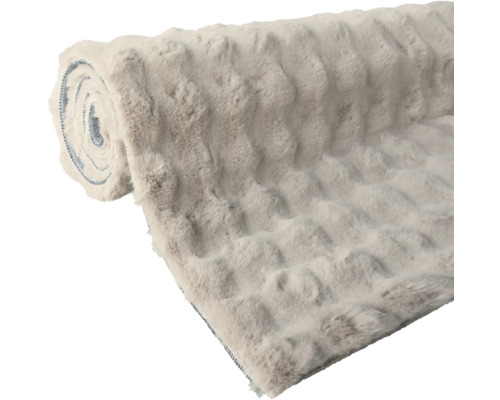 Opgerolde laagpolige vloerkleed