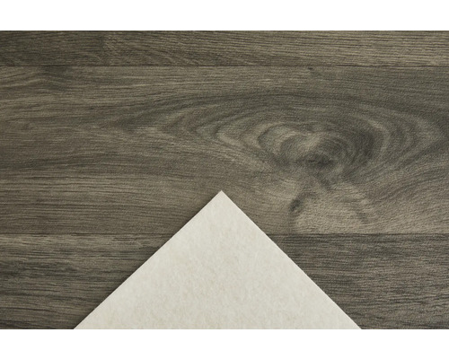 Close-up van geluidsisolatie op een houten vloer