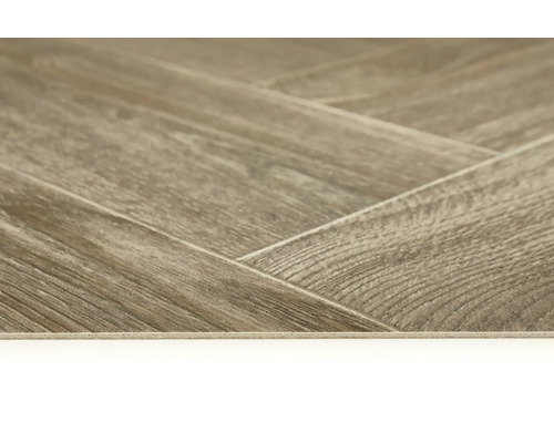 Close-up van vinylvloer in visgraatmotief