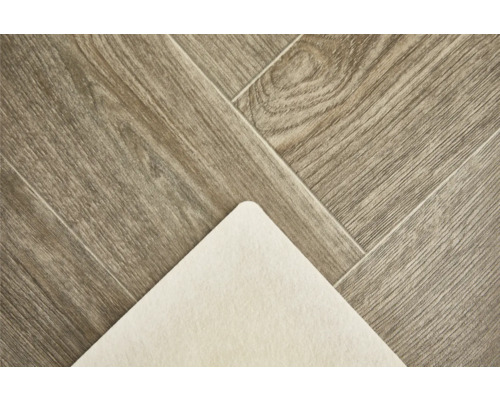 Detailopname van een vinylvloer in houtlook met geluidsreductie