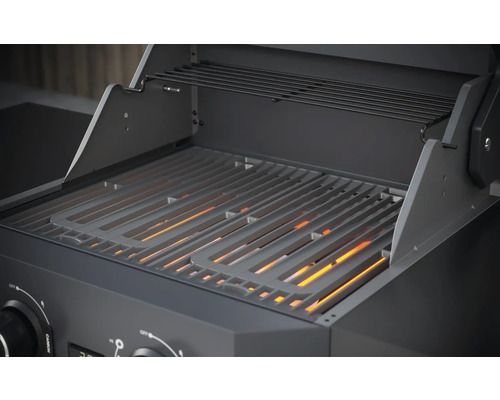 Gedetailleerd beeld van een gasbarbecue met grillrooster en warmhoudrek