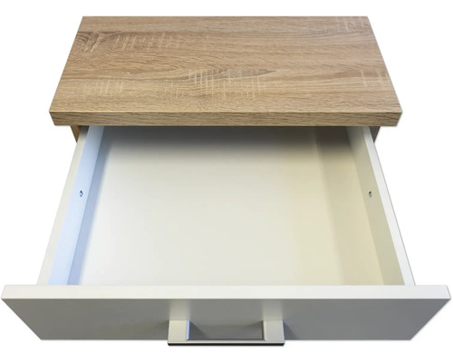 Open lade van een meubelstuk met houten blad