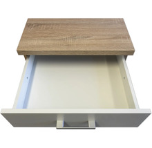 Geopende lade van hout en kunststof