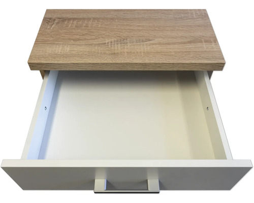 Geopende lade van hout en kunststof
