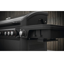 Detailopname van een zwarte gasbarbecue met draaiknoppen