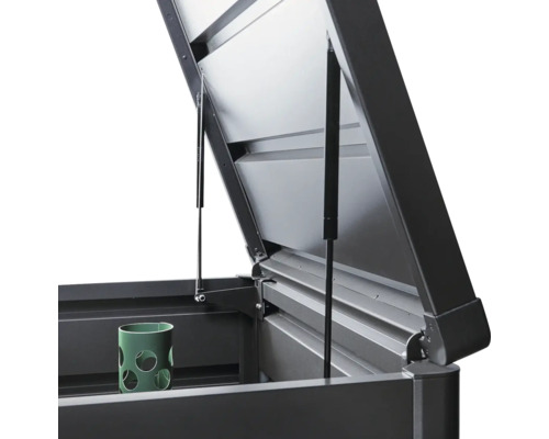 Geopende opbergbox met gasdrukveren en container