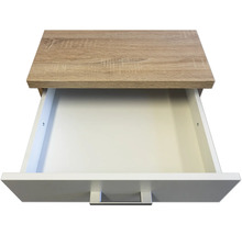 Open lade met houten decor bovenkant en witte voorkant.