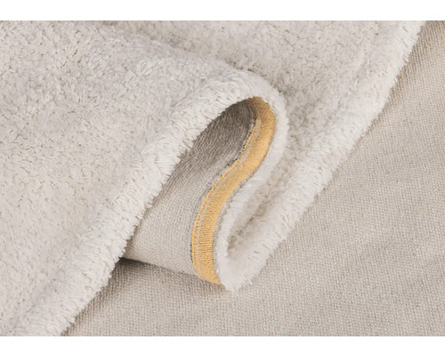 Detailopname van een licht badtapijt met zacht oppervlak