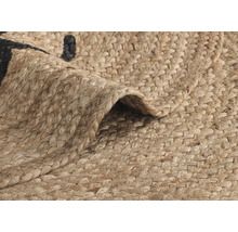 Close-up van een vloerkleed van jute met een patroon