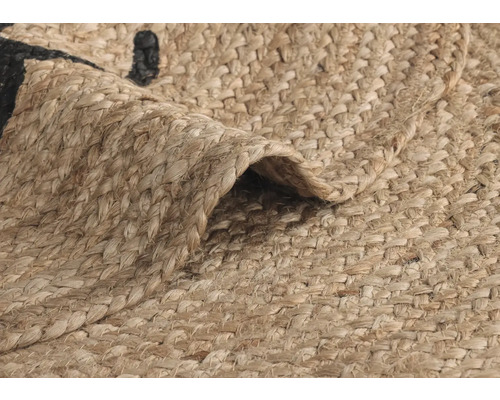 Close-up van een vloerkleed van jute met een patroon