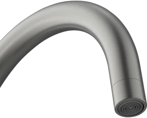 Detailopname van een gebogen metalen kraan