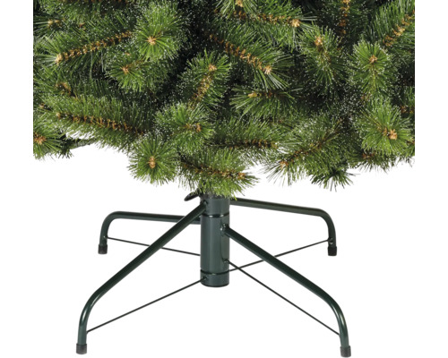 Detailweergave van een kunstkerstboom met metalen voet