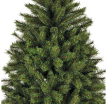 Close-up van een kunstkerstboom met groene naalden.