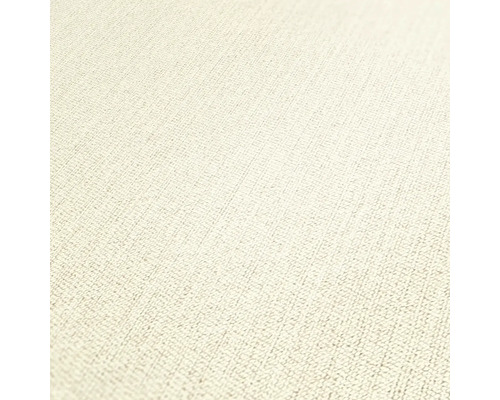 Close-up van een lichtgekleurd textielbehang met fijne weefstructuur