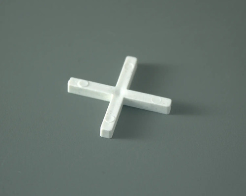 Tegelkruis voor het gelijkmatig leggen van tegels