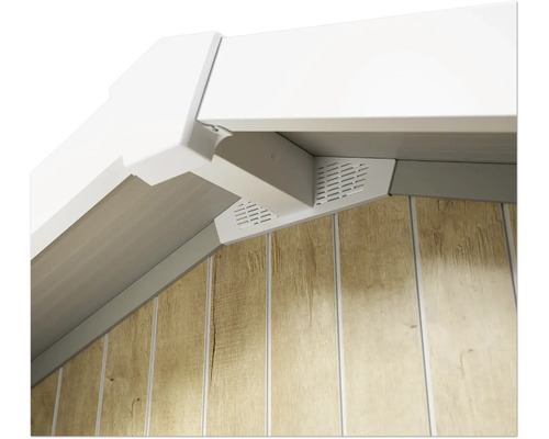 Detail van een witte dakrand met ventilatie