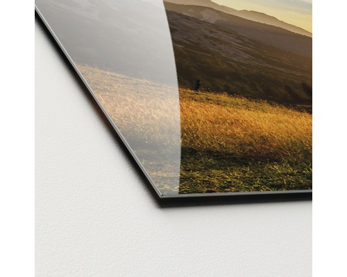 Close-up van een landschap op een acrylglasplaat.