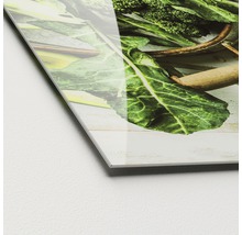 Close-up van een acrylglasplaat met een groentemotief