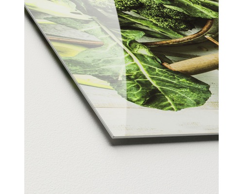 Close-up van een acrylglasplaat met een groentemotief