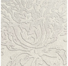 Close-up van een gestructureerd behang met een bloemmotief