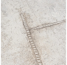 Close-up van een vinylbehang met gestructureerd motief