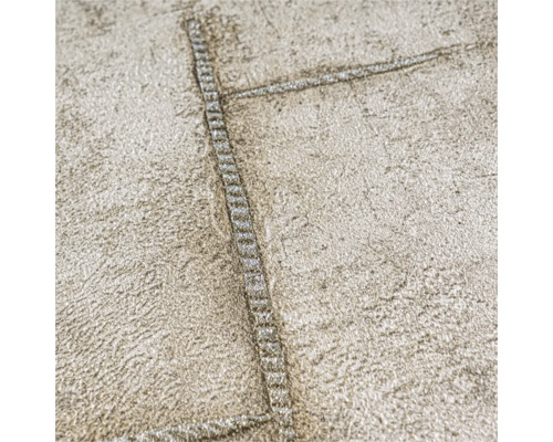 Close-up van een gestructureerd behang met stikselpatroon