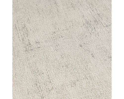 Close-up van een lichtgekleurd, gestructureerd behang met fijne patronen