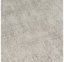 Close-up van een lichtgekleurd textielbehang met fijne structuur