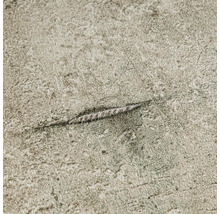 Close-up van een behang met stucwerktextuur