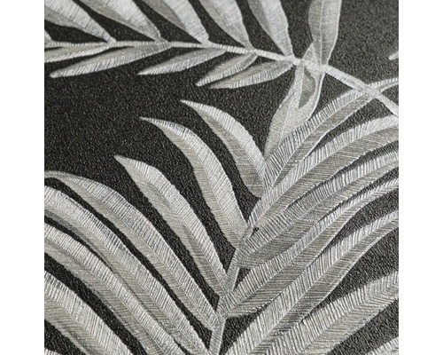 Close-up van een gestructureerd behang met bladerenmotief