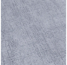 Close-up van een lichte, gestructureerde stof.