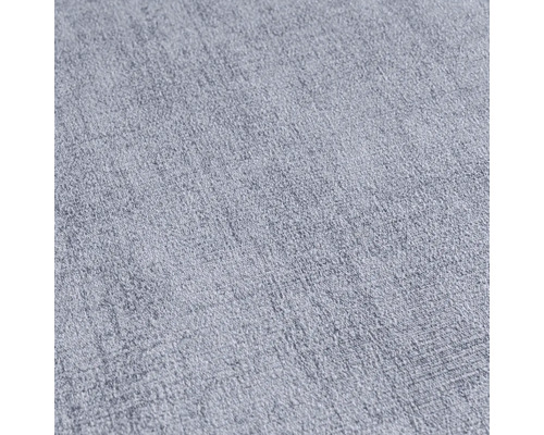 Close-up van een lichte, gestructureerde stof.