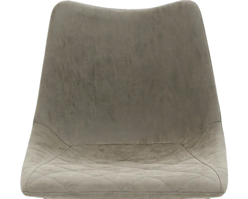 Detailopname van een stoel met stikselpatroon