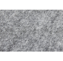 Detailopname van de textuur van een grijs afdekfleece van vilt.