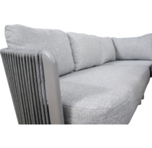 Grijze stoffen bank met armleuning