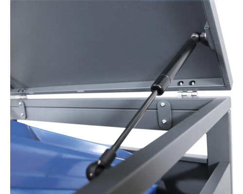 Detailopname vuilnisbakomhuizing met gasdrukveer