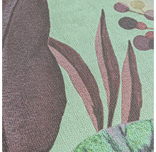 Close-up van een behang met patroon en plantmotieven