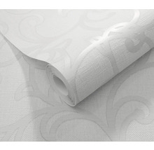 Rol wit vinylbehang met ornamentaal patroon