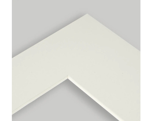 Detailweergave van een wit fotolijsthoekstuk